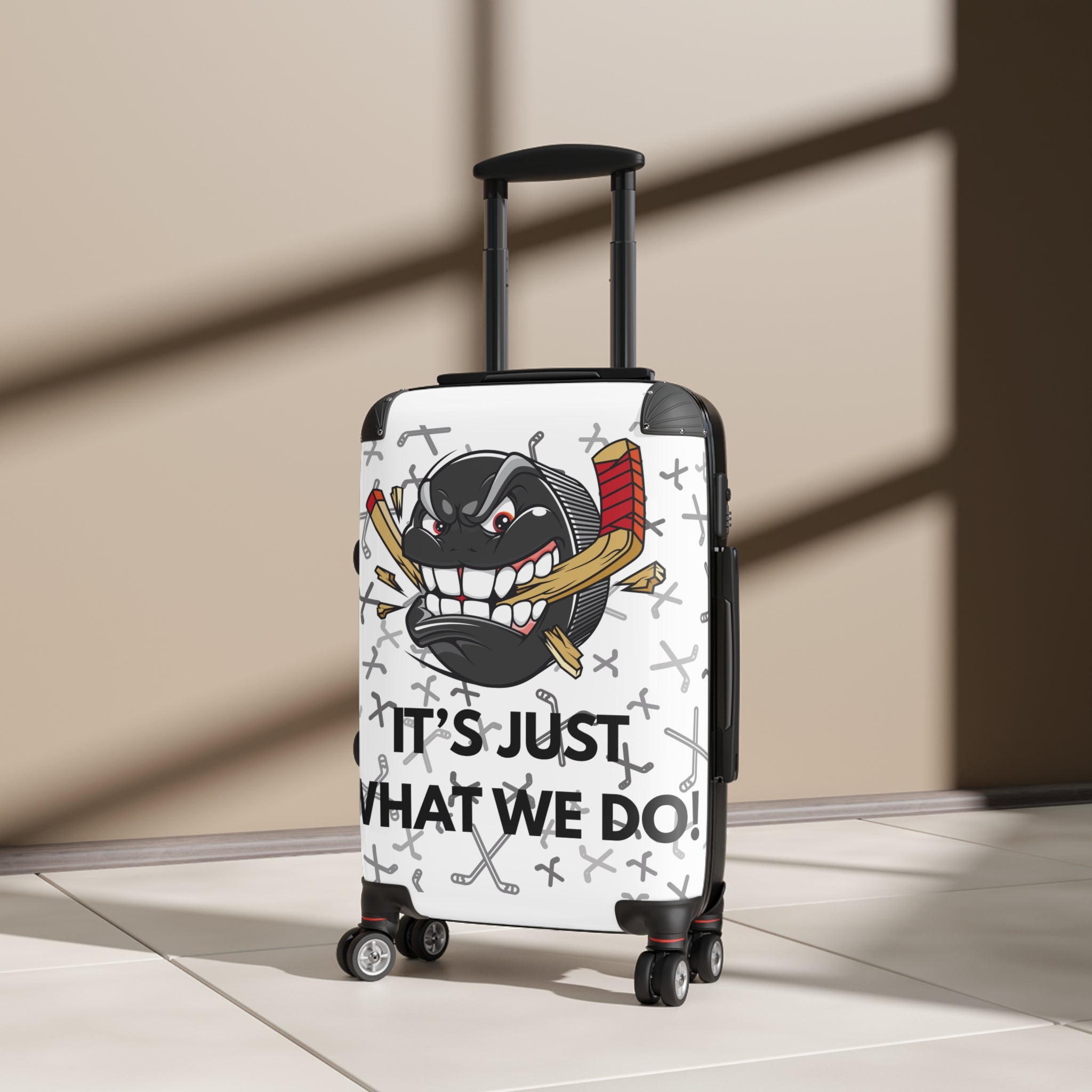 Hockey Puck Luggage – “It’s Just What We Do” Carry-On Suitcase