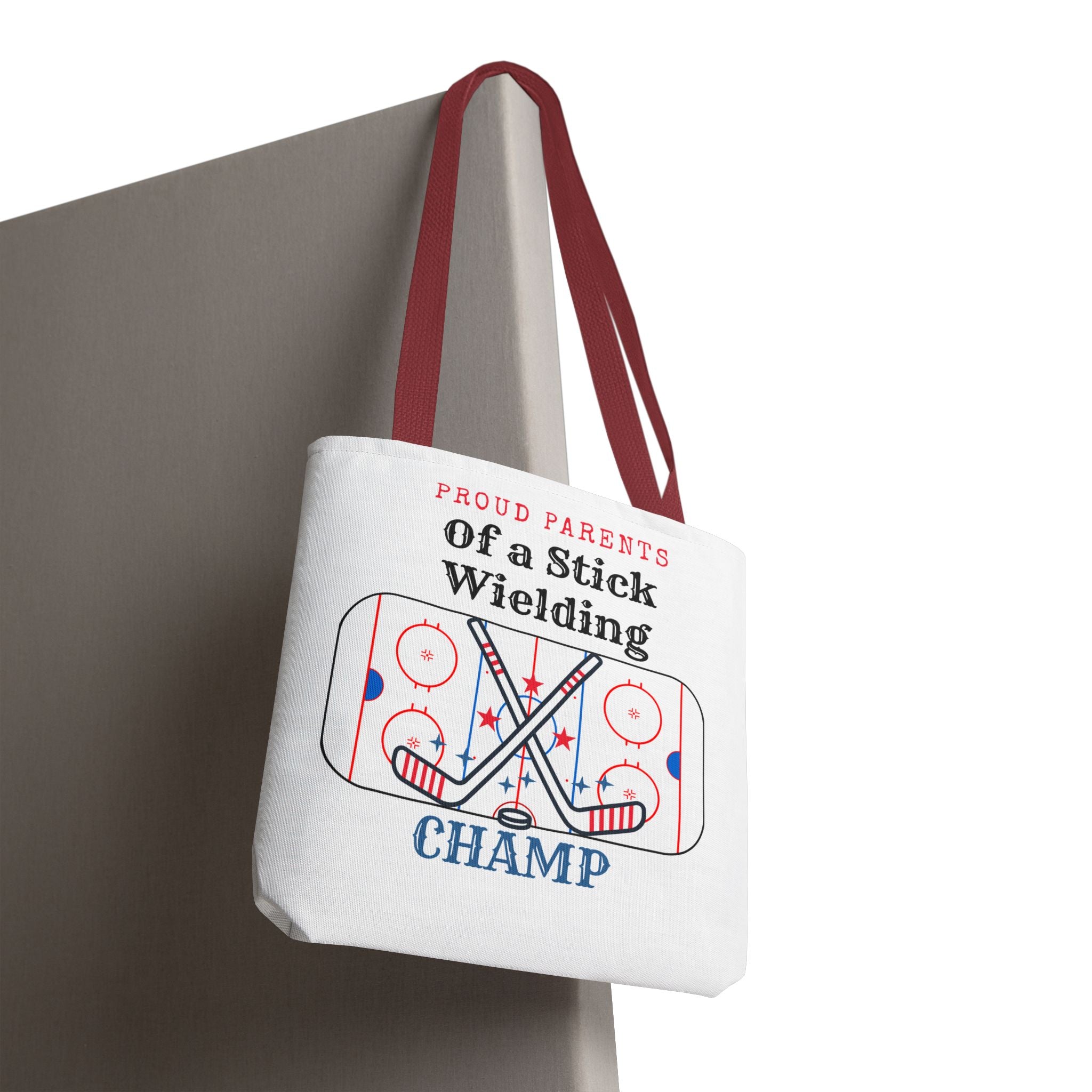 Hockey Mom/Dad Tote — "Proud Parents of a Stick Wielding Champ" Tote Bag
